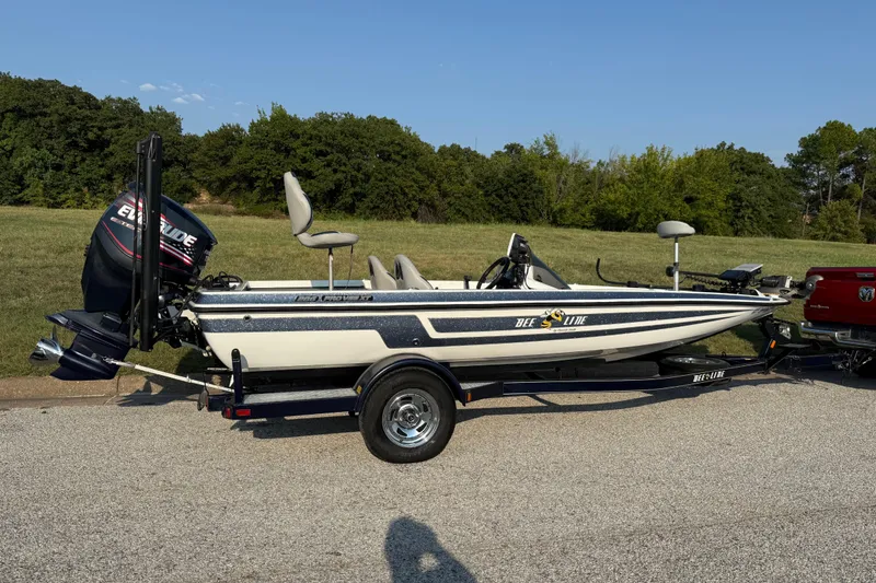 Slide: The Image of 2008 Bee Line 286 Pro Vee boat on trailer, parked outdoors. - 26