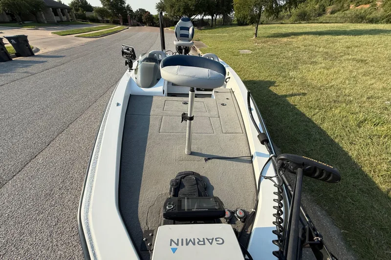 Slide: The Image of 2008 Bee Line 286 Pro Vee boat with Garmin equipment on a residential street. - 30