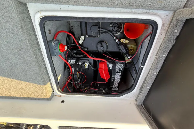 Slide: The Image of Battery compartment of 2008 Bee Line 286 Pro Vee boat with wiring and components. - 46