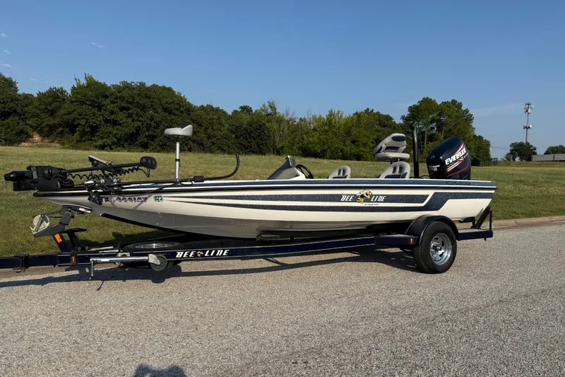 Slide: The Image of 2008 Bee Line 286 Pro Vee boat on trailer, parked on roadside. - 5