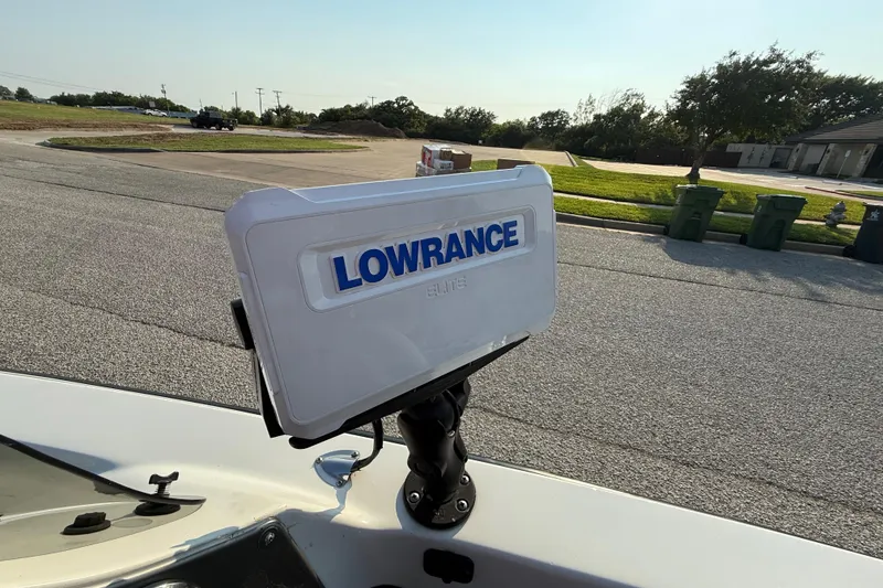 Slide: The Image of Lowrance Elite fishfinder on 2008 Bee Line 286 Pro Vee boat, parked outdoors. - 53