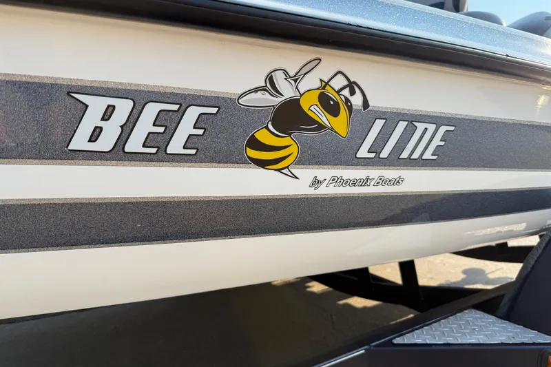 Slide: The Image of 2008 Bee Line 286 Pro Vee boat logo with bee graphic by Phoenix Boats. - 57