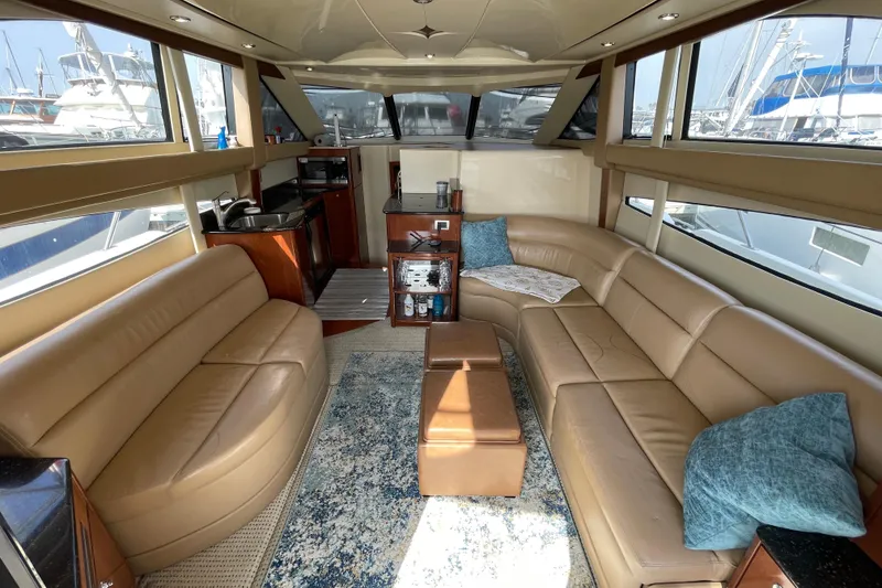 Slide: The Image of Luxurious interior of a 2008 Meridian 341 Sedan yacht with leather seating and modern amenities. - 16