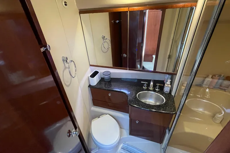 Slide: The Image of Luxurious bathroom in 2008 Meridian 341 Sedan yacht with modern amenities. - 28