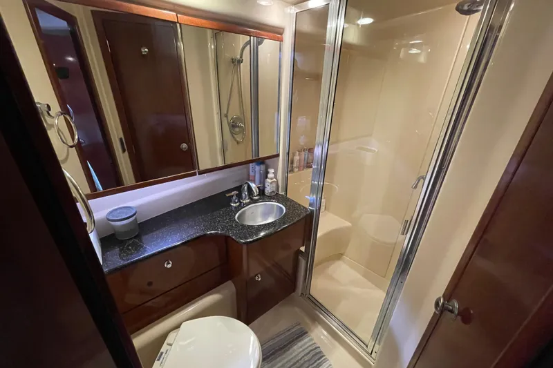 Slide: The Image of Luxurious bathroom in 2008 Meridian 341 Sedan yacht with shower and vanity. - 29