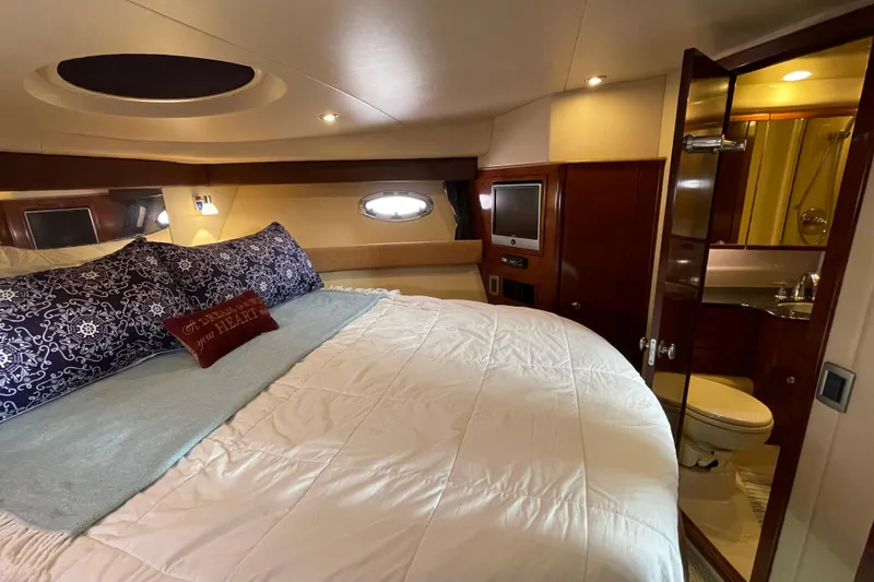 Slide: The Image of Luxurious 2008 Meridian 341 Sedan cabin with cozy bed and ensuite bathroom. - 32