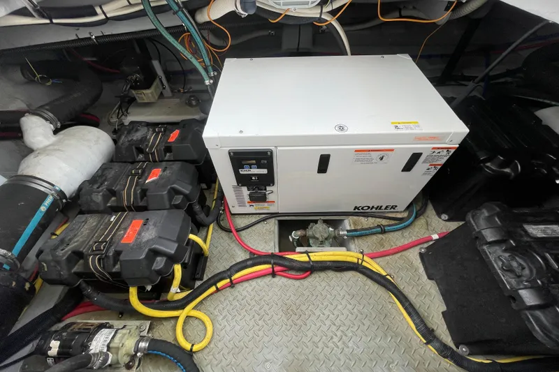 Slide: The Image of Engine room of 2008 Meridian 341 Sedan with Kohler generator and battery setup. - 33
