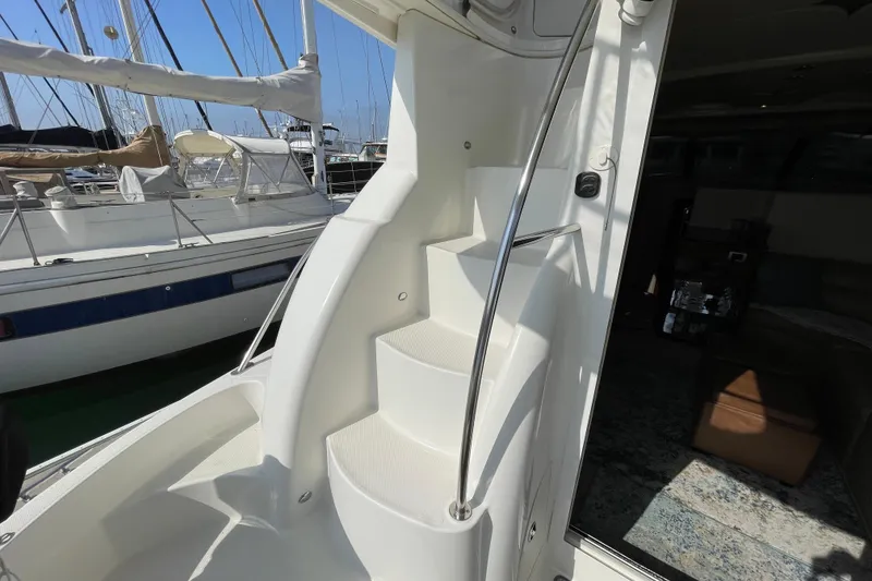 Slide: The Image of Staircase on a 2008 Meridian 341 Sedan yacht, docked at a marina. - 36