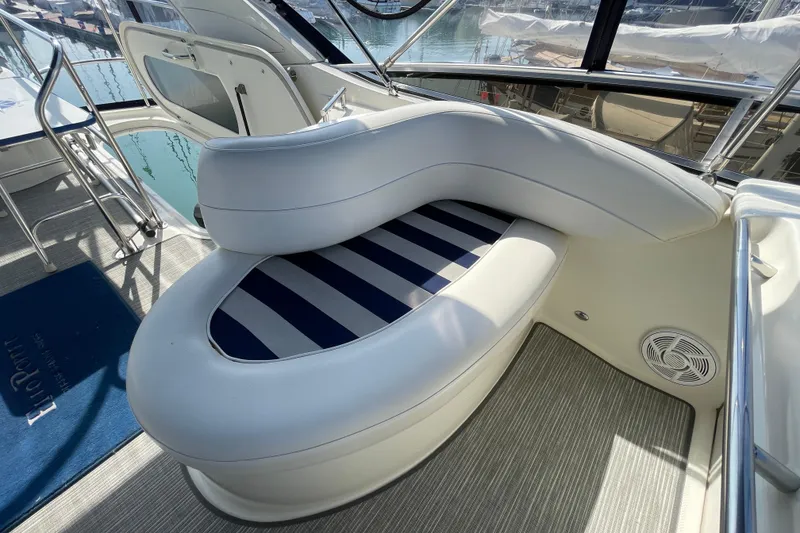 Slide: The Image of 2008 Meridian 341 Sedan yacht interior with striped seating and modern design. - 47