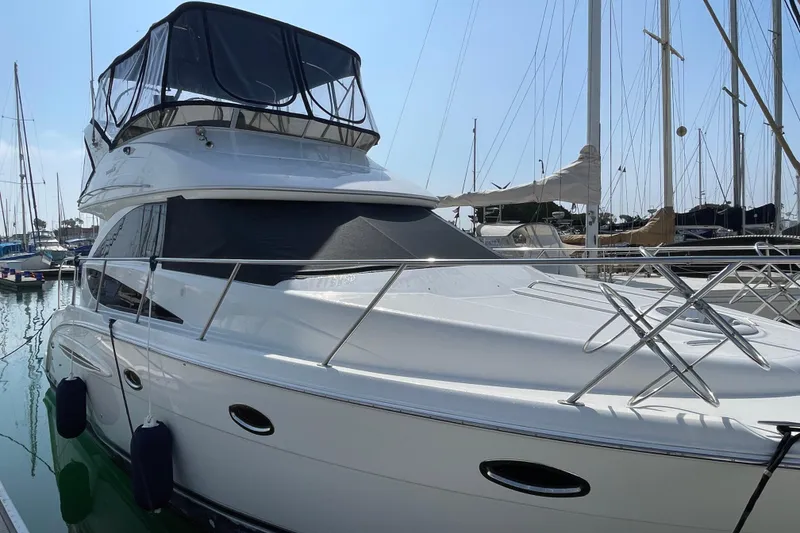 Slide: The Image of 2008 Meridian 341 Sedan yacht docked at marina, featuring sleek design and modern amenities. - 5