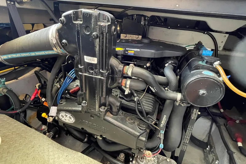 Slide: The Image of Engine compartment of a 2008 Meridian 341 Sedan boat, showcasing mechanical components. - 55