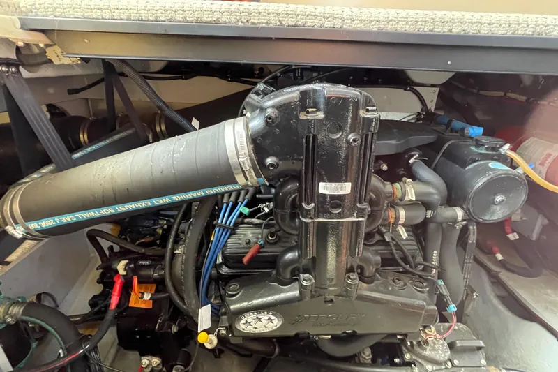 Slide: The Image of Engine compartment of a 2008 Meridian 341 Sedan, showcasing detailed mechanical components. - 56