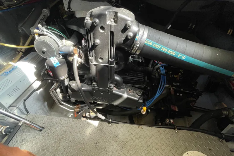 Slide: The Image of Engine compartment of a 2008 Meridian 341 Sedan boat, showcasing mechanical components. - 57