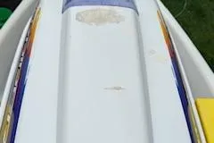 Slide: The Image of 1996 Yamaha WaveRunner 650 Waverunner III, top view, white with colorful accents. - 7