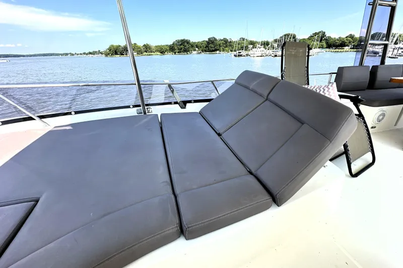 Slide: The Image of Control panel of a 2016 Prestige 550 yacht with joystick and switches. - 20