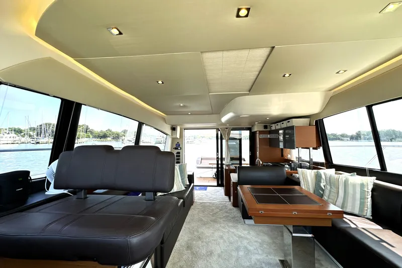 Slide: The Image of Luxurious 2016 Prestige 550 yacht deck with city skyline view. - 25