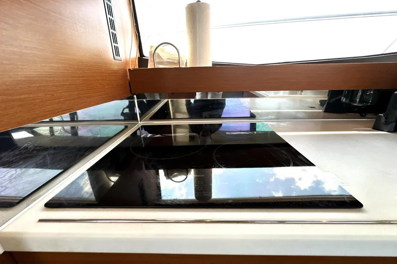 Slide: The Image of Luxurious 2016 Prestige 550 yacht interior with marina view and modern seating. - 29