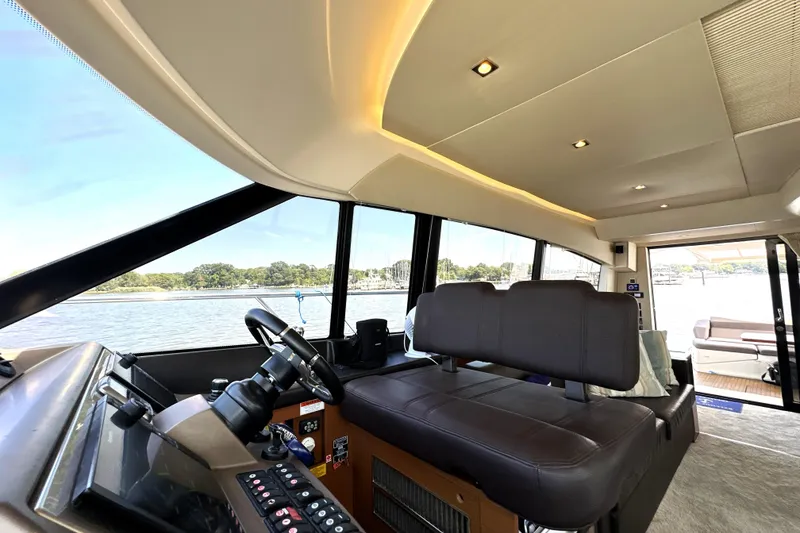 Slide: The Image of Luxurious kitchen interior of 2016 Prestige 550 yacht with modern appliances and sleek design. - 38