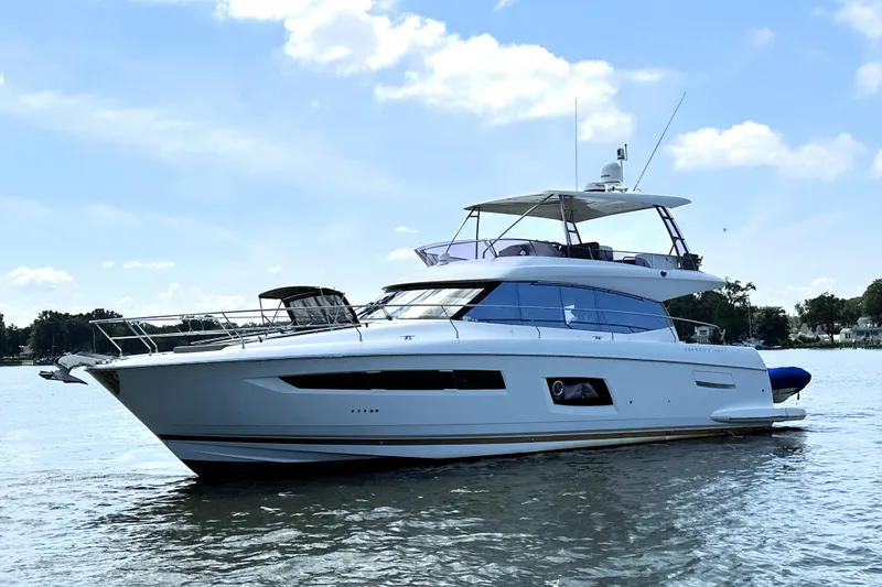 Slide: The Image of Luxurious 2016 Prestige 550 yacht deck with city skyline view. - 4