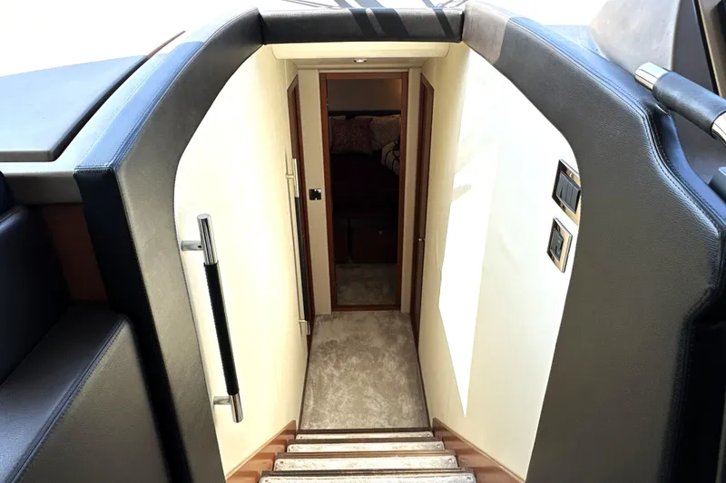 Slide: The Image of Interior view of 2016 Prestige 550 yacht with scenic waterway and city skyline. - 46