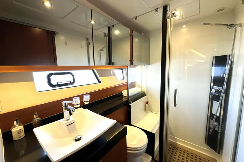 Slide: The Image of Interior view of a 2016 Prestige 550 yacht cockpit with navigation screens. - 50