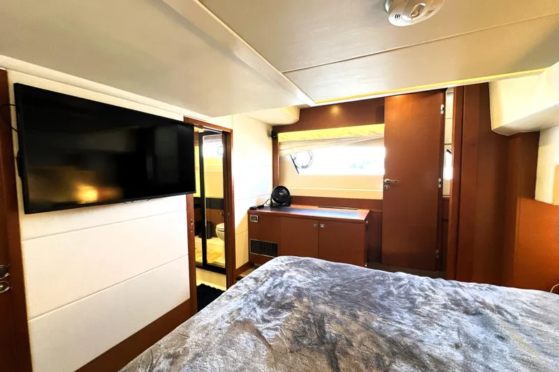 Slide: The Image of Luxurious bathroom in 2016 Prestige 550 yacht with modern fixtures and elegant design. - 59