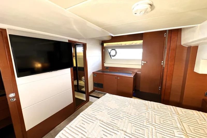 Slide: The Image of Luxurious cabin interior of a 2016 Prestige 550 yacht with modern amenities. - 67
