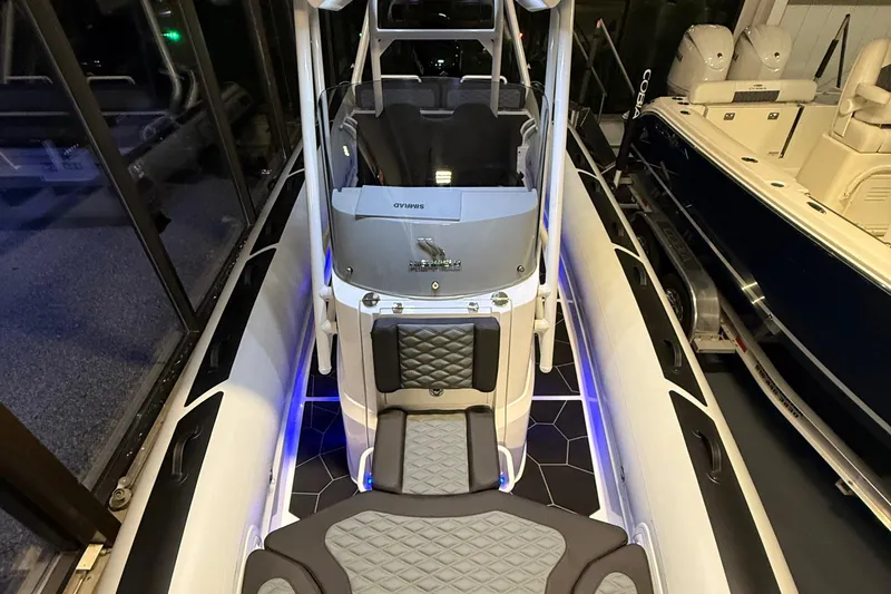 Slide: The Image of 2026 Highfield Sport 760 boat interior with modern seating and sleek design. - 5