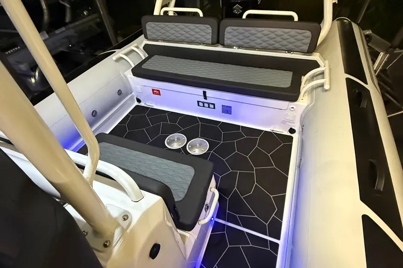 Slide: The Image of Interior of 2026 Highfield Sport 760 boat with modern seating and flooring design. - 6