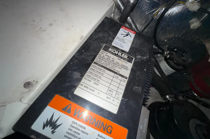 Slide: The Image of Kohler generator label with warning sign on 2004 Four Winns 298 Vista boat. - 42