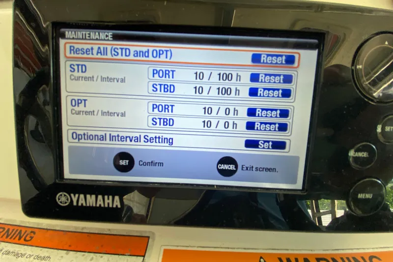 Slide: The Image of Yamaha maintenance screen on 2006 Pursuit 3480 Drummond Island Runner boat, showing reset options. - 30
