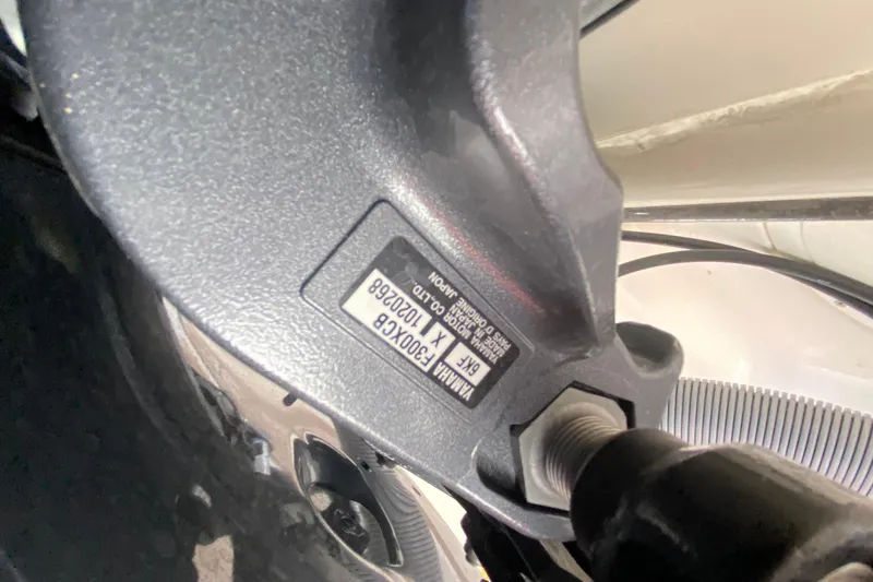 Slide: The Image of Close-up of a Yamaha motor part on a 2006 Pursuit 3480 Drummond Island Runner. - 46