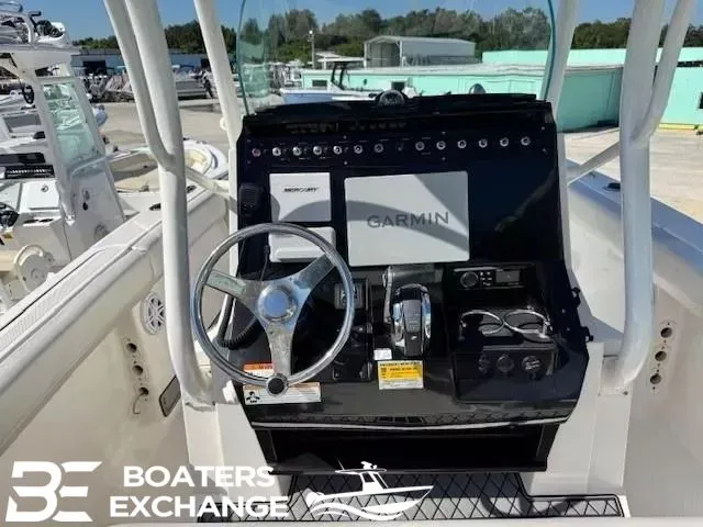 Slide: The Image of 2018 Wellcraft 242 Fisherman boat dashboard with Garmin navigation system at Boaters Exchange. - 5