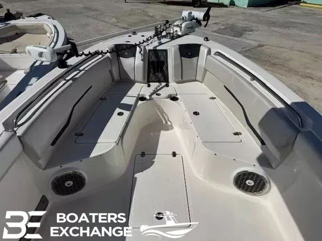 Slide: The Image of 2018 Wellcraft 242 Fisherman boat interior with seating and storage, displayed at Boaters Exchange. - 8