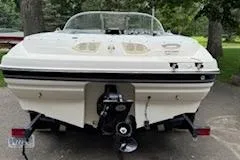 Slide: The Image of 2007 Bayliner 195 Fishing Ski boat, rear view, parked outdoors. - 7