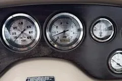 Slide: The Image of Dashboard gauges of a 2002 Chaparral 200 SSe boat. - 6
