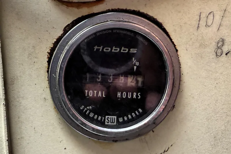 Slide: The Image of Hour meter on 1978 Bertram 42 Convertible boat, showing total engine hours. - 41
