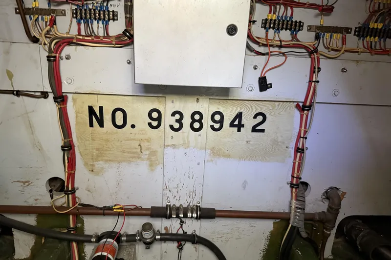 Slide: The Image of Engine room wiring of 1978 Bertram 42 Convertible, showing serial number 938942. - 45
