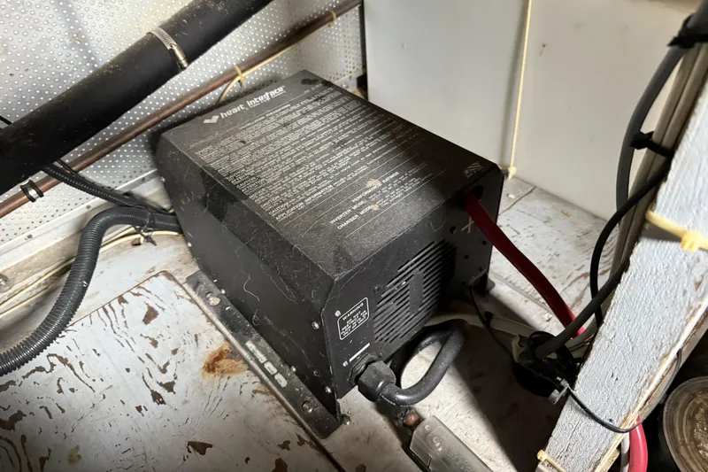 Slide: The Image of Battery charger in a 1978 Bertram 42 Convertible boat engine room. - 47