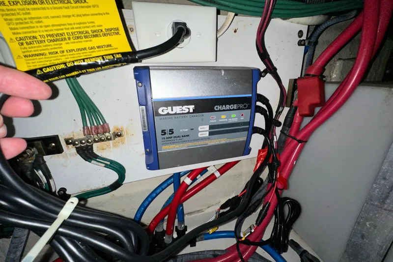 Slide: The Image of Marine battery charger setup in a 2006 Sea Ray 260 Sundancer boat. - 47