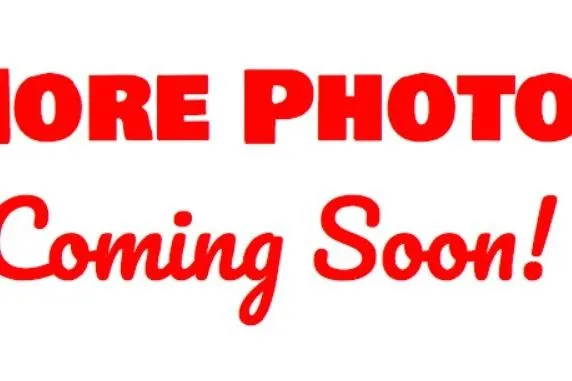 Slide: The Image of "More photos coming soon" text for 1998 Four Winns 240 Horizon boat. - 25