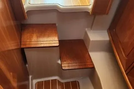 Slide: The Image of Interior stairs of 2013 Cutwater C-26 boat with wooden steps. - 8