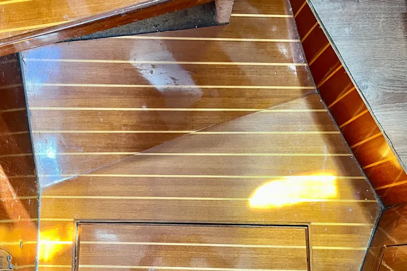 Slide: The Image of Polished wooden interior of a 1978 Morgan 415 yacht, showcasing elegant craftsmanship. - 30