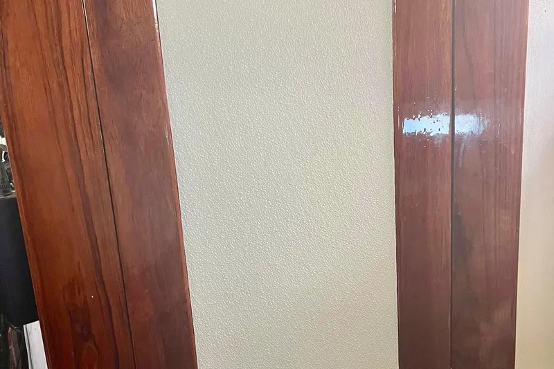 Slide: The Image of Wooden interior paneling of a 1978 Morgan 415, showcasing rich grain and polished finish. - 42