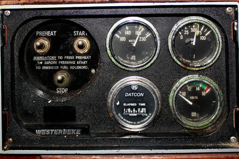 Slide: The Image of 1978 Morgan 415 control panel with gauges and switches, featuring Westerbeke branding. - 43