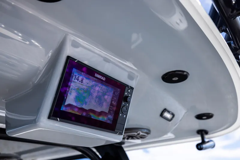 Slide: The Image of Simrad display on 2023 Freeman 47 boat, mounted on white ceiling panel. - 106