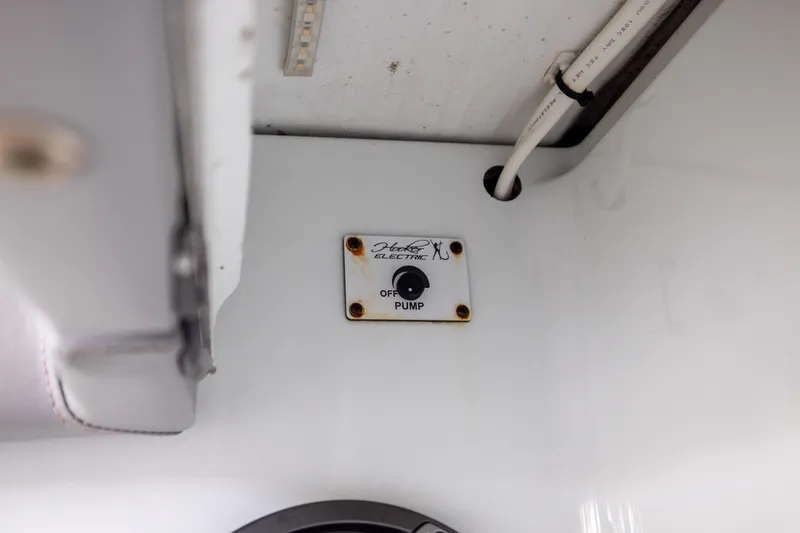 Slide: The Image of Control panel for pump switch on Freeman 47, 2023 model boat. - 107