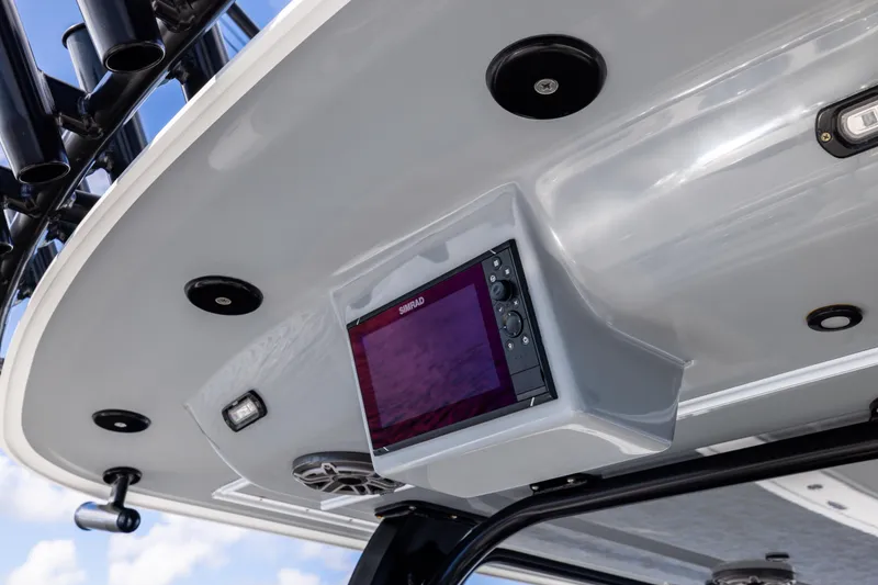Slide: The Image of 2023 Freeman 47 boat with Simrad display and overhead speakers. - 50