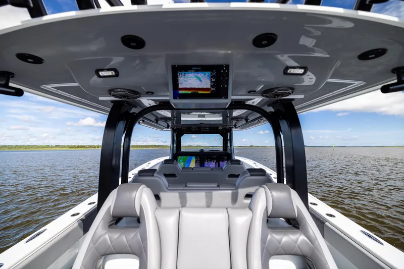 Slide: The Image of Interior view of 2023 Freeman 47 boat with modern seating and navigation system. - 53