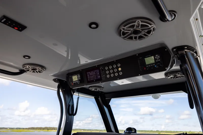 Slide: The Image of Interior view of 2023 Freeman 47 boat's control panel and speakers. - 70